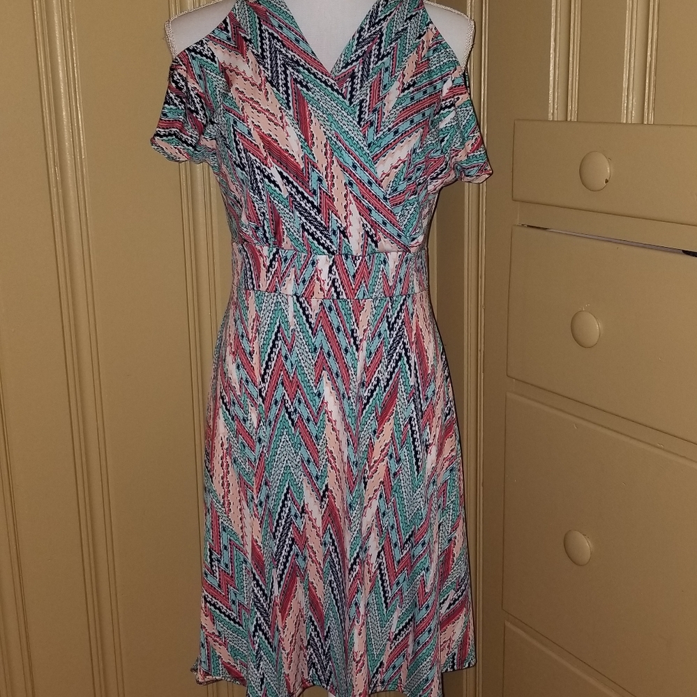 Beautiful cold shoulder multicolor spandex dress.